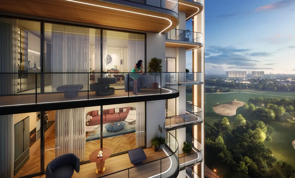 Double-height living room with glass balcony overlooking greenery