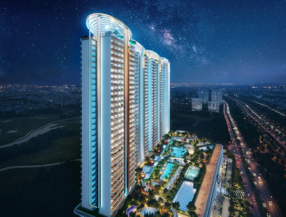 M3M Jacob & Co Residences tower and pool deck lit up at night, Noida Expressway